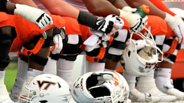 CHAPEL HILL, NORTH CAROLINA - OCTOBER 10: The Virginia Tech Hokies offensive line waits to go back into the game against the North Carolina Tar Heels at Kenan Stadium on October 10, 2020 in Chapel Hill, North Carolina. North Carolina won 56-45. (Photo by Grant Halverson/Getty Images)