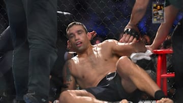 May 14, 2016; Curitiba, Brazil; Fabricio Werdum (red) lay dazes on the mat after losing to Stipe Miocic (not pictured) during UFC 198 Fight Night at Arena Atletico Paranaense. Mandatory Credit: Jason Silva-USA TODAY Sports