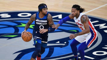 MINNEAPOLIS, MINNESOTA - DECEMBER 23: Derrick Rose #25 of the Detroit Pistons defends against D'Angelo Russell #0 of the Minnesota Timberwolves during the first quarter of the season opening game at Target Center on December 23, 2020 in Minneapolis, Minnesota. NOTE TO USER: User expressly acknowledges and agrees that, by downloading and or using this Photograph, user is consenting to the terms and conditions of the Getty Images License Agreement (Photo by Hannah Foslien/Getty Images)