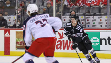 Jan 6, 2022; Newark, New Jersey, USA; New Jersey Devils center Jack Hughes (86) skates with the puck against the Columbus Blue Jackets during the second period at Prudential Center. Mandatory Credit: Ed Mulholland-USA TODAY Sports
