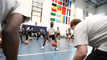 JOHANNESBURG, SOUTH AFRICA - AUGUST 2: Kemba Walker of the Charlotte Hornets takes part in the Jr. NBA Special Olympics clinic as part of Basketball Without Borders Africa at the American International School of Johannesburg on August 2, 2017 in Gauteng province of Johannesburg, South Africa. NOTE TO USER: User expressly acknowledges and agrees that, by downloading and or using this photograph, User is consenting to the terms and conditions of the Getty Images License Agreement. Mandatory Copyright Notice: Copyright 2017 NBAE (Photo by Nathaniel S. Butler/NBAE via Getty Images)