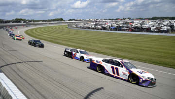 Denny Hamlin, Joe Gibbs Racing, and Kyle Larson, Hendrick Motorsports, NASCAR (Photo by Logan Riely/Getty Images)