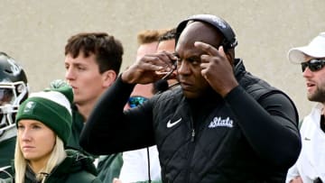 Oct 15, 2022; East Lansing, Michigan, USA; Michigan State Spartans head coach Mel Tucker talks on the headset against the Wisconsin Badgers at Spartan Stadium. Mandatory Credit: Dale Young-USA TODAY Sports
