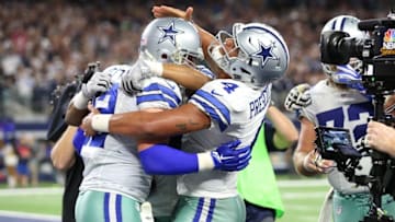 Oct 30, 2016; Arlington, TX, USA; Dallas Cowboys tight end Jason Witten (82) celebrates his overtime touchdown catch with quarterback Dak Prescott (4) against the Philadelphia Eagles at AT&T Stadium. The Cowboys beat the Eagles 29-23. Mandatory Credit: Matthew Emmons-USA TODAY Sports