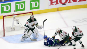 EDMONTON, ALBERTA - AUGUST 02: Elias Pettersson #40 of the Vancouver Canucks battles with Jonas Brodin #25 of the Minnesota Wild as Alex Stalock #32 of the Minnesota Wild defends the net in Game One of the Western Conference Qualification Round prior to the 2020 NHL Stanley Cup Playoffs at Rogers Place on August 02, 2020 in Edmonton, Alberta, Canada. (Photo by Jeff Vinnick/Getty Images)