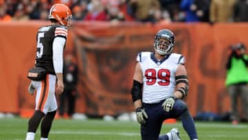 Nov 16, 2014; Cleveland, OH, USA; Houston Texans defensive end J.J. Watt (99) reacts after being called for roughing the kicker on Cleveland Browns punter Spencer Lanning (5) during the second quarter at FirstEnergy Stadium. Mandatory Credit: Ken Blaze-USA TODAY Sports