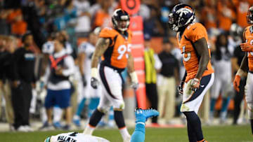 DENVER, CO - SEPTEMBER 08: Cam Newton (1) of the Carolina Panthers lies on the turf after getting hit hard by Darian Stewart (26) of the Denver Broncos and Shaquil Barrett (48) during the fourth quarter of the Broncos' 21-20 win. The Denver Broncos hosted the Carolina Panthers on Thursday, September 8, 2016. (Photo by John Leyba/The Denver Post via Getty Images)