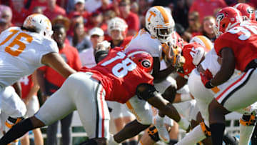 October 1, 2016: Trenton Thompson (78) Georgia Bulldogs defensive linemen tackles Alvin Kamara (6) Tennessee Volunteers running back as he is rushing for yardage during the game between the Tennessee Volunteers and the Georgia Bulldogs. The Tennessee Volunteers (34) defeated the Georgia Bulldogs (31) at Sanford Stadium in Athens, Ga. (Photo by Jeffrey Vest/Icon Sportswire via Getty Images)