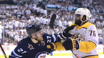 WINNIPEG, MB - MAY 7: Nikolaj Ehlers #27 of the Winnipeg Jets and P.K. Subban #76 of the Nashville Predators mix it up during third period action in Game Six of the Western Conference Second Round during the 2018 NHL Stanley Cup Playoffs at the Bell MTS Place on May 7, 2018 in Winnipeg, Manitoba, Canada. (Photo by Darcy Finley/NHLI via Getty Images)