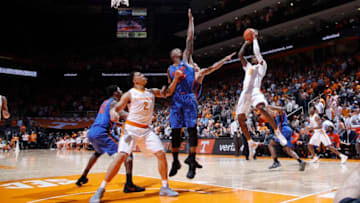 KNOXVILLE, TN - FEBRUARY 21: Jordan Bone #0 of the Tennessee Volunteers shoots the ball against Keith Stone #25 of the Florida Gators in the first half of a game at Thompson-Boling Arena on February 21, 2018 in Knoxville, Tennessee. (Photo by Joe Robbins/Getty Images)
