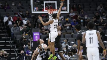 SACRAMENTO, CALIFORNIA - FEBRUARY 02: Cam Thomas #24 of the Brooklyn Nets shoots and scores over Buddy Hield #24 of the Sacramento Kings during the first quarter of their game at Golden 1 Center on February 02, 2022 in Sacramento, California. NOTE TO USER: User expressly acknowledges and agrees that, by downloading and or using this photograph, User is consenting to the terms and conditions of the Getty Images License Agreement. (Photo by Thearon W. Henderson/Getty Images)