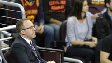 Nov 22, 2014; Cleveland, OH, USA; Cleveland Cavaliers general manager David Griffin (L) watches from the team box in the first quarter at Quicken Loans Arena. Mandatory Credit: David Richard-USA TODAY Sports