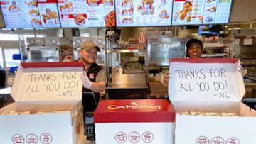 KFC restaurant team members in Louisville, Ky. pack up more than one hundred meals to deliver to local hospital workers fighting the COVID-19 pandemic. Photo provided by KFC