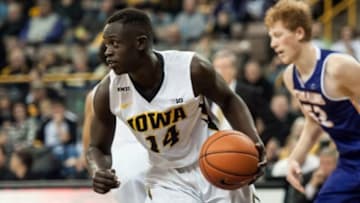 Dec 7, 2015; Iowa City, IA, USA; Iowa Hawkeyes guard Peter Jok (14) brings the ball up court during the first half at Carver-Hawkeye Arena. Iowa won 90-56. Mandatory Credit: Jeffrey Becker-USA TODAY Sports