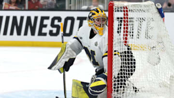 BOSTON, MASSACHUSETTS - APRIL 07: Erik Portillo #1 of the Michigan Wolverines tends net during overtime of the Frozen Four semifinal game between the Michigan Wolverines and Denver Pioneers at TD Garden on April 07, 2022 in Boston, Massachusetts. The Pioneers defeat the Wolverines 3-2. (Photo by Maddie Meyer/Getty Images)