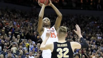 LOUISVILLE, KENTUCKY - MARCH 30: Mamadi Diakite #25 of the Virginia Cavaliers makes a game-tying shot over Matt Haarms #32 of the Purdue Boilermakers to extend the game to overtime as time expires in the second half of the 2019 NCAA Men's Basketball Tournament South Regional at KFC YUM! Center on March 30, 2019 in Louisville, Kentucky. (Photo by Andy Lyons/Getty Images)
