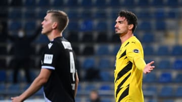 Dortmund's German defender Mats Hummels (R) celebrates scoring during the German first division Bundesliga football match between Arminia Bielefeld and Borussia Dortmund on October 31, 2020 in Bielefeld, western Germany. (Photo by Ina FASSBENDER / POOL / AFP) / DFL REGULATIONS PROHIBIT ANY USE OF PHOTOGRAPHS AS IMAGE SEQUENCES AND/OR QUASI-VIDEO (Photo by INA FASSBENDER/POOL/AFP via Getty Images)