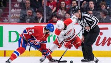 MONTREAL, QC - MARCH 23: Face-off between Montreal Canadiens left wing Phillip Danault (24) and Carolina Hurricanes center Elias Lindholm (16) during the first period of the NHL regular season game between the Carolina Hurricanes and the Montreal Canadiens on March 23, 2017, at the Bell Centre in Montreal, QC (Photo by Vincent Ethier/Icon Sportswire via Getty Images)