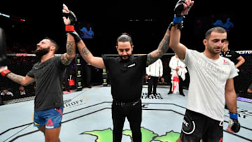 COPENHAGEN, DENMARK - SEPTEMBER 28: (L-R) Brandon Davis and Giga Chikadze of Georgia react after their featherweight bout is ruled a draw during the UFC Fight Night event at Royal Arena on September 28, 2019 in Copenhagen, Denmark. (Photo by Jeff Bottari/Zuffa LLC/Zuffa LLC via Getty Images)