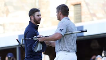 MAMARONECK, NEW YORK - SEPTEMBER 20: Bryson DeChambeau (R) of the United States and Matthew Wolff (L) of the United States shake hands on the 18th green after DeChambeau won the 120th U.S. Open Championship on September 20, 2020 at Winged Foot Golf Club in Mamaroneck, New York. (Photo by Jamie Squire/Getty Images)