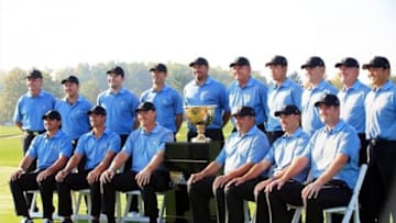 Oct 1, 2013; Dublin, OH, USA; Members of the International Team (back row) Mark McNulty , Richard Sterne , Branden Grace , Graham DeLaet , Brendan de Jonge , Nick Price , Hideki Matsuyama , Louis Oosthuizen , Tony Johnsstone , Shigeki Maruyama. Front row Jason Day , Adam Scott , Ernie Els , Angel Cabrera , Charl Schwartzel and Marc Leishman pose during a photo call on the practice ground prior to the start of The Presidents Cup at Muirfield Village Golf Club. Mandatory Credit: Allan Henry-USA TODAY Sports