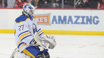 Apr 11, 2023; Newark, New Jersey, USA; Buffalo Sabres goaltender Devon Levi (27) reflects during a time out during the first period against the New Jersey Devils at Prudential Center. Mandatory Credit: Vincent Carchietta-USA TODAY Sports