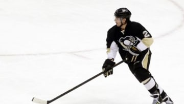 Apr 1, 2014; Pittsburgh, PA, USA; Pittsburgh Penguins defenseman Matt Niskanen (2) skates with the puck against the Carolina Hurricanes during the second period at the CONSOL Energy Center. Carolina won 4-1. Mandatory Credit: Charles LeClaire-USA TODAY Sports