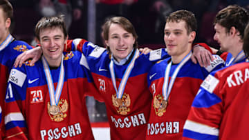 MONTREAL, QC - JANUARY 05: Members of Team Russia celebrate their victory during the 2017 IIHF World Junior Championship bronze medal game against Team Sweden at the Bell Centre on January 5, 2017 in Montreal, Quebec, Canada. Team Russia defeated Team Sweden 2-1 in overtime to win the bronze medal. (Photo by Minas Panagiotakis/Getty Images)