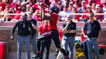 LUBBOCK, TEXAS - OCTOBER 05: Wide receiver Erik Ezukanma #84 of the Texas Tech Red Raiders catches a pass during the second half of the college football game against the Oklahoma State Cowboys on October 05, 2019 at Jones AT&T Stadium in Lubbock, Texas. (Photo by John E. Moore III/Getty Images)