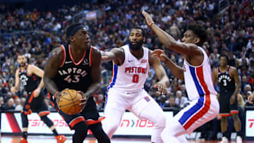 TORONTO, ON - OCTOBER 30: Pascal Siakam #43 of the Toronto Raptors dribbles the ball as Andre Drummond #0 and Langston Galloway #9 of the Detroit Pistons defend during the second half of an NBA game at Scotiabank Arena on October 30, 2019 in Toronto, Canada. NOTE TO USER: User expressly acknowledges and agrees that, by downloading and or using this photograph, User is consenting to the terms and conditions of the Getty Images License Agreement. (Photo by Vaughn Ridley/Getty Images)