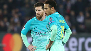 PARIS, FRANCE - FEBRUARY 14: Lionel Messi and Neymar Jr of FC Barcelona look on during the UEFA Champions League Round of 16 first leg match between Paris Saint-Germain and FC Barcelona at Parc des Princes on February 14, 2017 in Paris, France. (Photo by Jean Catuffe/Getty Images)
