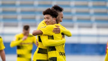 MARBELLA, SPAIN - JANUARY 08: Pierre-Emerick Aubameyang of Borussia Dortmund celebrates after scoring the goal to the 3:2 with Jadon Sancho during a friendly match between Borussia Dortmund and SV Zulte Waregem as part of the training camp at the Estadio Municipal de Marbella on January 08, 2018 in Marbella, Spain. (Photo by Alexandre Simoes/Borussia Dortmund/Getty Images)