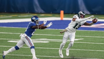 Nov 15, 2020; East Rutherford, New Jersey, USA; Philadelphia Eagles wide receiver Travis Fulgham (13) attempts to catch a pass in front of New York Giants safety Jabrill Peppers (21) during the second half at MetLife Stadium. Mandatory Credit: Vincent Carchietta-USA TODAY Sports