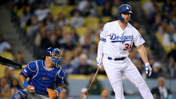 LOS ANGELES, CALIFORNIA - MAY 28: Joc Pederson #31 of the Los Angeles Dodgers reacts to his strikeout in front of Wilson Ramos #40 of the New York Mets during the seventh inning at Dodger Stadium on May 28, 2019 in Los Angeles, California. (Photo by Harry How/Getty Images)