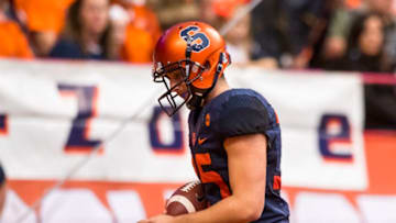 SYRACUSE, NY - SEPTEMBER 09: Sterling Hofrichter #35 of the Syracuse Orange lowers his head as he walks a bobbled snap out of the end zone for a Middle Tennessee Blue Raiders safety during the first quarter on September 9, 2017 at The Carrier Dome in Syracuse, New York. (Photo by Brett Carlsen/Getty Images)