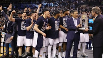 BOSTON, MA - MARCH 25: Head coach Jay Wright of the Villanova Wildcats is presented with the East Regional Champion trophy after defeating the Texas Tech Red Raiders 71-59 in the 2018 NCAA Men's Basketball Tournament East Regional to advance to the 2018 Final Four at TD Garden on March 25, 2018 in Boston, Massachusetts. (Photo by Elsa/Getty Images)