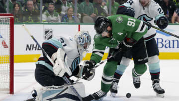 May 15, 2023; Dallas, Texas, USA; Dallas Stars center Tyler Seguin (91) attempts to poke the puck past Seattle Kraken goaltender Philipp Grubauer (31) during the second period in game seven of the second round of the 2023 Stanley Cup Playoffs at the American Airlines Center. Mandatory Credit: Jerome Miron-USA TODAY Sports
