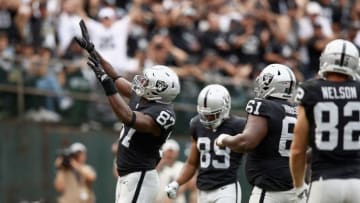 OAKLAND, CA - SEPTEMBER 30: Jared Cook #87 of the Oakland Raiders celebrates after he scored a touchdown against the Cleveland Browns at Oakland-Alameda County Coliseum on September 30, 2018 in Oakland, California. (Photo by Ezra Shaw/Getty Images)