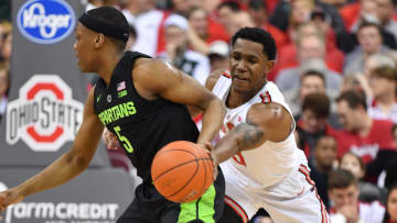 COLUMBUS, OH - JANUARY 5: C.J. Jackson #3 of the Ohio State Buckeyes pokes the ball away from Cassius Winston #5 of the Michigan State Spartans in the first half on January 5, 2019 at Value City Arena in Columbus, Ohio. (Photo by Jamie Sabau/Getty Images)