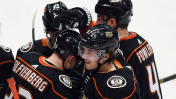 ANAHEIM, CA - MARCH 22: Anaheim Ducks leftwing Rickard Rakell (67) with his teammates after Rakell scored a goal in the third period of a game against the San Jose Sharks played on March 22, 2019 at the Honda Center in Anaheim, CA. (Photo by John Cordes/Icon Sportswire via Getty Images)