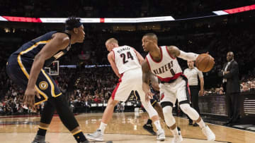 Nov 30, 2016; Portland, OR, USA; Portland Trail Blazers guard Damian Lillard (0) is guarded by Indiana Pacers center Myles Turner (33) during the fourth quarter at Moda Center at the Rose Quarter. The Trail Blazers won 131- 109. Mandatory Credit: Troy Wayrynen-USA TODAY Sports