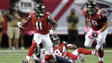 Oct 12, 2014; Atlanta, GA, USA; Atlanta Falcons wide receiver Julio Jones (11) runs after a catch against the Chicago Bears during the first half at the Georgia Dome. Mandatory Credit: Dale Zanine-USA TODAY Sports