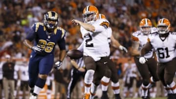 Aug 23, 2014; Cleveland, OH, USA; Cleveland Browns quarterback Johnny Manziel (2) runs in for a touchdown in the third quarter against the St. Louis Rams at FirstEnergy Stadium. Mandatory Credit: Rick Osentoski-USA TODAY Sports