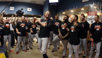 Oct 1, 2014; Pittsburgh, PA, USA; San Francisco Giants right fielder Hunter Pence (8) leads the team in a cheer after defeating the Pittsburgh Pirates in the 2014 National League Wild Card playoff baseball game at PNC Park. The Giants won 8-0. Mandatory Credit: Charles LeClaire-USA TODAY Sports