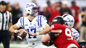 DETROIT, MI - DECEMBER 26: Daniel Jones #17 of the Duke Blue Devils throws a first half pass while playing the Northern Illinois Huskies during the Quick Lane Bowl at Ford Field on December 26, 2017 in Detroit Michigan. (Photo by Gregory Shamus/Getty Images)