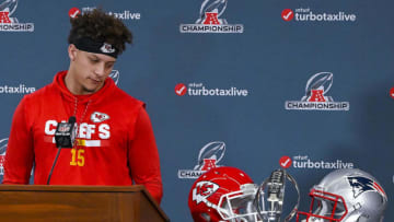 Kansas City Chiefs quarterback Patrick Mahomes looks at the Lamar Hunt Trophy during a news conference in Kansas City, Mo., on Wednesday, Jan. 16, 2019, ahead of the AFC Championship game against the New England Patriots. (John Sleezer/Kansas City Star/TNS via Getty Images)