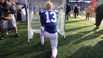 Oct 16, 2016; East Rutherford, NJ, USA; New York Giants wide receiver Odell Beckham Jr. (13) gets on one knee and proposes to the kicking net after scoring a touchdown against the Baltimore Ravens during the fourth quarter at MetLife Stadium. Mandatory Credit: Brad Penner-USA TODAY Sports