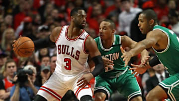 CHICAGO, IL - APRIL 23: Dwyane Wade #3 of the Chicago Bulls moves against Avery Bradley #0 and Al Horford #42 of the Boston Celtics during Game Four of the Eastern Conference Quarterfinals during the 2017 NBA Playoffs at the United Center on April 23, 2017 in Chicago, Illinois. The Celtics defeated the Bulls 104-95. (Photo by Jonathan Daniel/Getty Images)