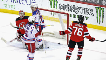 NEWARK, NEW JERSEY - APRIL 18: Mika Zibanejad #93 of the New York Rangers scores the game winning goal on the powerplay at 17:00 of the third period against Mackenzie Blackwood #29 of the New Jersey Devils at the Prudential Center on April 18, 2021 in Newark, New Jersey. The Rangers defeated the Devils 5-3. (Photo by Bruce Bennett/Getty Images)
