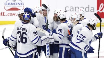 Toronto Maple Leafs players celebrate their overtime win over the Winnipeg Jets. (James Carey Lauder-USA TODAY Sports)